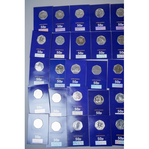 391 - A collection of UK picture back 50p pieces in Change Checker packs, comprising twenty-one dinosaur t... 