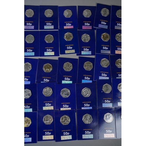 391 - A collection of UK picture back 50p pieces in Change Checker packs, comprising twenty-one dinosaur t... 