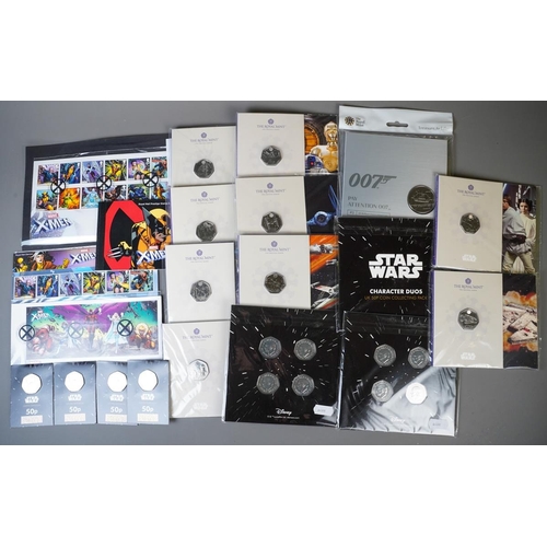 393 - A small collection of coins and stamps relating to popular culture / TV / Film, including a Marvel X... 