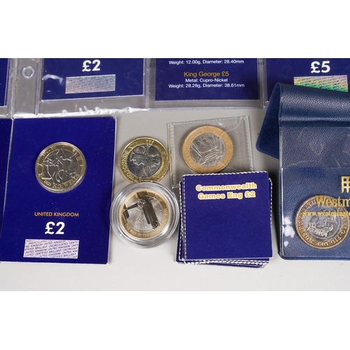 394 - Three Change Checker Commemorative Coin Sets of 50 pence, £2 and £5 coins, (15 coins), 16 x £2 coins... 