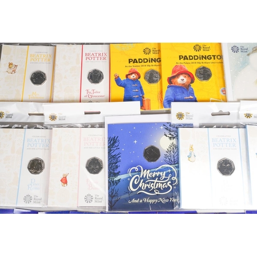 398 - UK COINS: A collection of current pictorial back 50 pence pieces all of children's story themes, inc... 