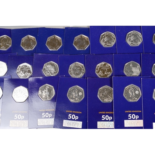 398 - UK COINS: A collection of current pictorial back 50 pence pieces all of children's story themes, inc... 