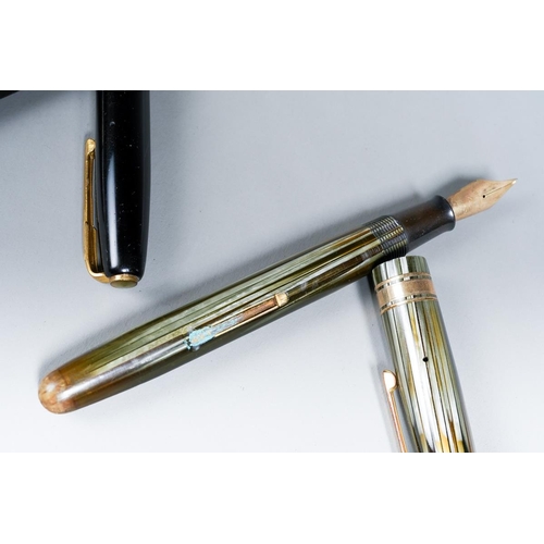 406 - A vintage Waterman W5 grey striated lever fill fountain pen with gilt bands to cap, the nib stamped ... 