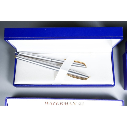 413 - Three cased Waterman duo sets comprising blue mottled and gilt fountain pen and ballpoint, gilt nib ... 