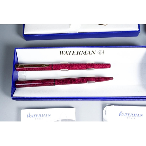 413 - Three cased Waterman duo sets comprising blue mottled and gilt fountain pen and ballpoint, gilt nib ... 
