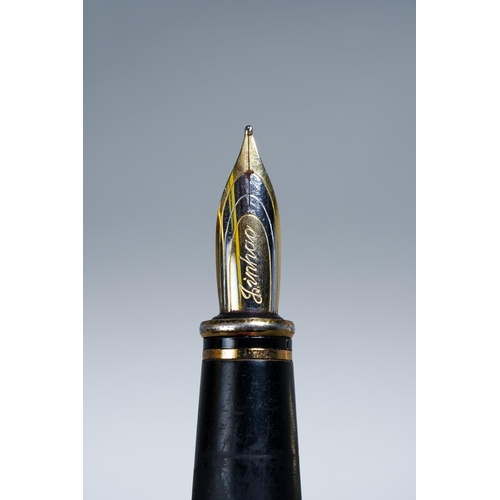 414 - A boxed Chinese Jinhao black and gilt metal Fountain Pen, the barrel decorated with landscape, the c... 