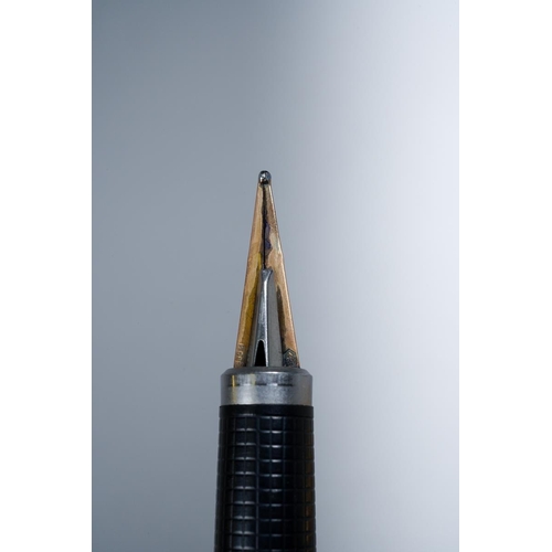 415 - A Parker 180 gold plated fountain pen, the barrel and cap engine turned with dot decoration, the nib... 