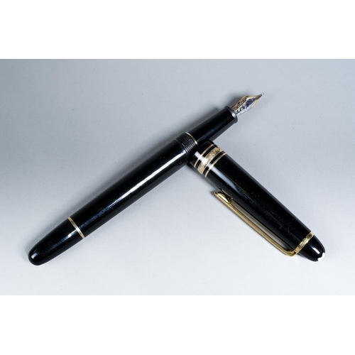 418 - A Montblanc Meisterstuck black and gilt Fountain Pen with two-tone 14K nib stamped 4810, the cap mou... 