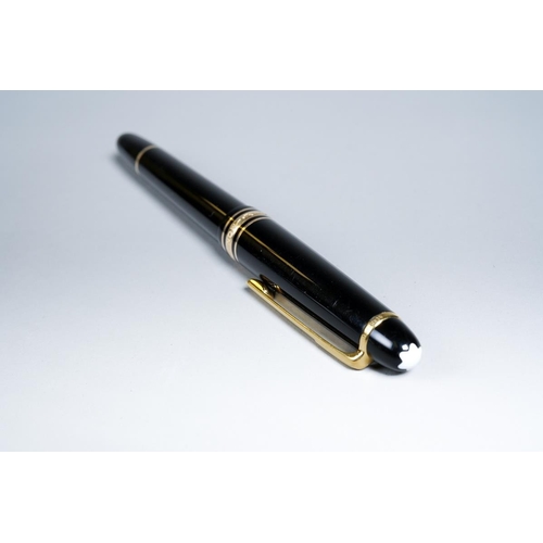 418 - A Montblanc Meisterstuck black and gilt Fountain Pen with two-tone 14K nib stamped 4810, the cap mou... 