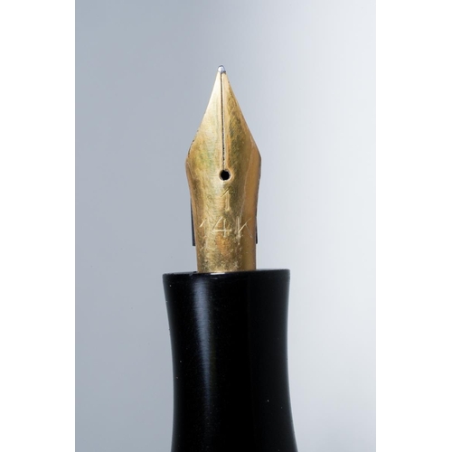 419 - A vintage Montblanc black and gilt fountain pen, the nib stamped 14k and 1., with Mountain logo etch... 