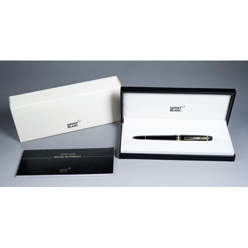 421 - A Montblanc Meisterstuck black and gilt Fountain pen with two-tone 14k gold nib stamped 4810, the cl... 