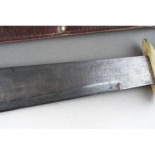 38 - Commemorative Bowie Knife with heavy single edged blade 265mm in length with etched design of a stea... 