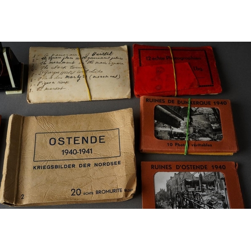 44 - A small group of World War Two memorabilia including black and white postcard packs from the 1940s O... 