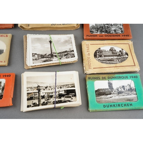 44 - A small group of World War Two memorabilia including black and white postcard packs from the 1940s O... 