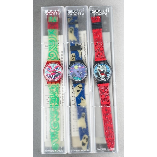 Three boxed 1990s Swatch themed watches including Dracula, Monster Time ...