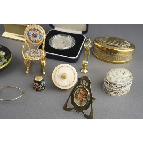 42 - A parel of 19th and 20th century metal curios, etc, including a bone gaming spinner, a miniature bel... 