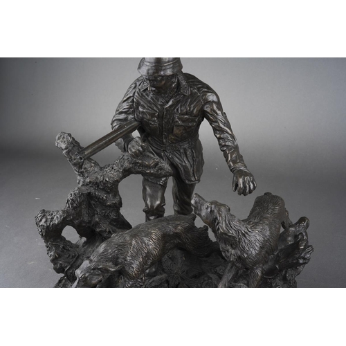 52 - Two Heredities bronzed resin figure groups, comprising a game shooter with his two hounds, s.d., hei... 