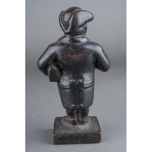 60 - A late 19th Century cast iron paperweight modelled as Rev Joshua Brooks aka The Manchester Man, appr... 