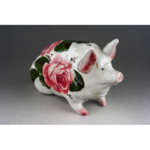 244 - An early 20th Century small Wemyss Ware Cabbage Roses Pig, circa 1900, impressed WEMYSS under right ... 