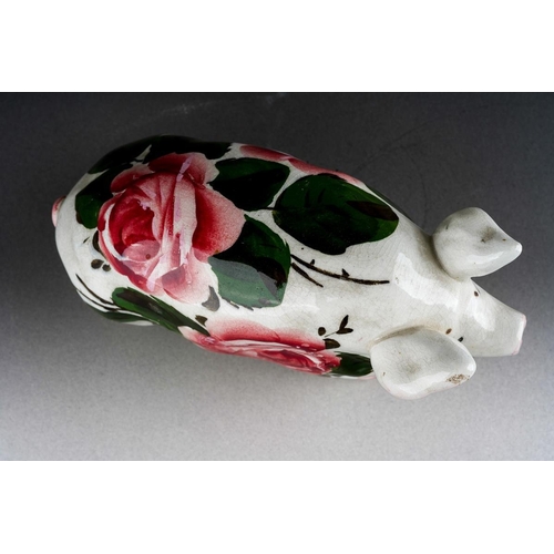 245 - An early 20th Century small Wemyss Ware Cabbage Roses Pig, circa 1900, impressed WEMYSS, circa 16cm ... 