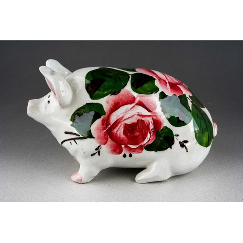 245 - An early 20th Century small Wemyss Ware Cabbage Roses Pig, circa 1900, impressed WEMYSS, circa 16cm ... 