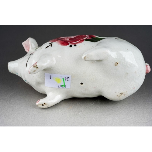 245 - An early 20th Century small Wemyss Ware Cabbage Roses Pig, circa 1900, impressed WEMYSS, circa 16cm ... 