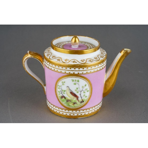 246 - A 19th Century French probably Paris porcelain teapot, pink pompadour ground decorated with central ... 