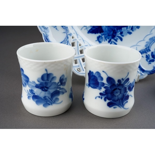 247 - A group of four Royal Copenhagen blue and white to include: a pair of goblets decorated with flowers... 