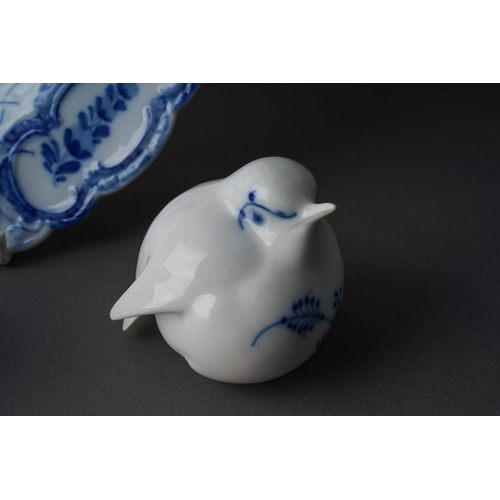 247 - A group of four Royal Copenhagen blue and white to include: a pair of goblets decorated with flowers... 