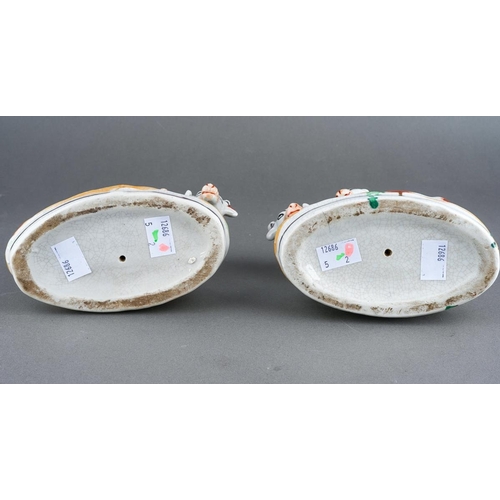 252 - A pair of Staffordshire type models, each with a red and white Cows with her calf, unmarked [2]