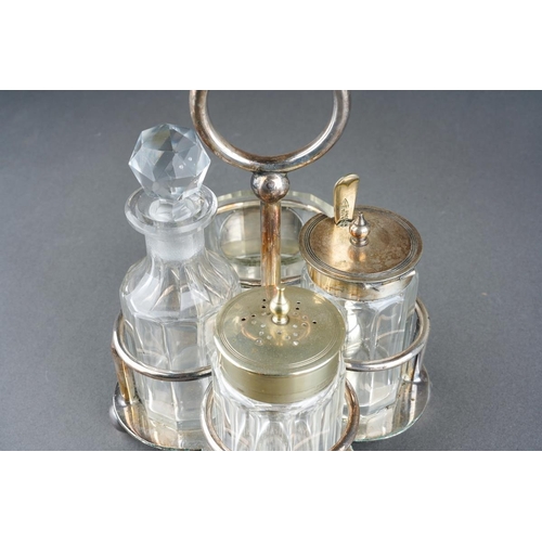 257 - An early 20th Century silver plate quatre foil shaped Officers Mess cruet stand with loop handle, th... 