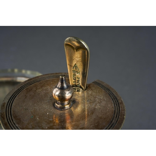 257 - An early 20th Century silver plate quatre foil shaped Officers Mess cruet stand with loop handle, th... 