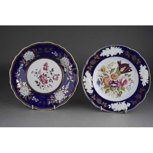 265 - Two early 19th century English porcelain hand painted dessert plates, both with blue and gilt border... 