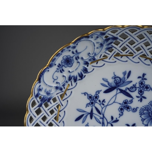 270 - A Meissen Blue Onion pattern wavy rimmed and pierced circular dish, crossed sword marks verso and nu... 