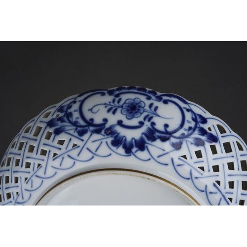 270 - A Meissen Blue Onion pattern wavy rimmed and pierced circular dish, crossed sword marks verso and nu... 