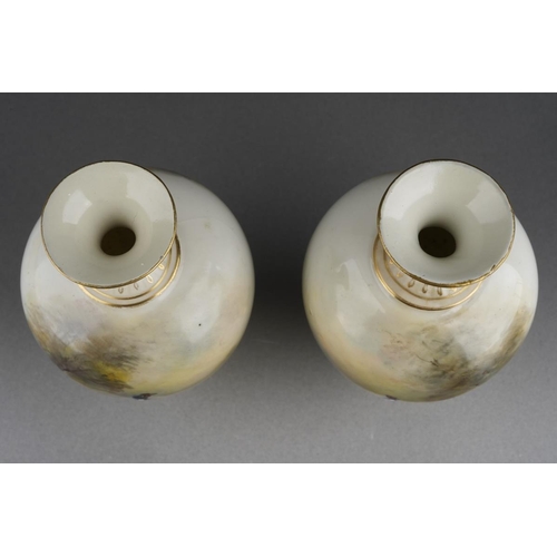 274 - A pair of Royal Worcester ovoid vases painted with cock and hen pheasants on an ivory ground by Jame... 