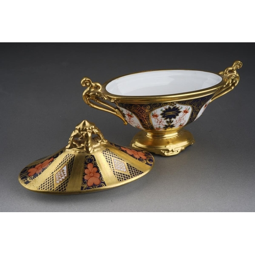 280 - A Royal Crown Derby 1128 Imari solid gold band twin handled oval pedestal dish and cover, bears date... 