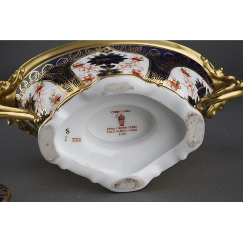 280 - A Royal Crown Derby 1128 Imari solid gold band twin handled oval pedestal dish and cover, bears date... 