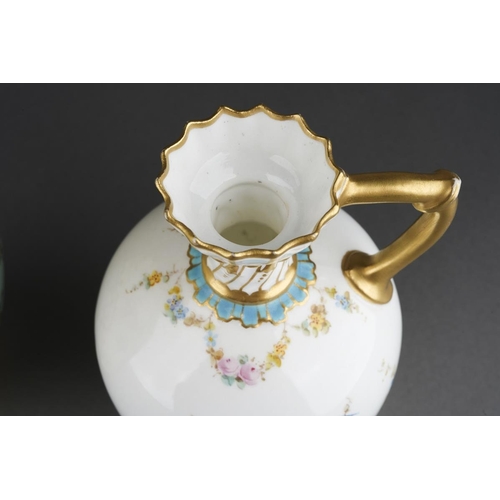 286 - Two pieces of floral decorated Royal Crown Derby, comprising a pale blue baluster vase with frilled ... 