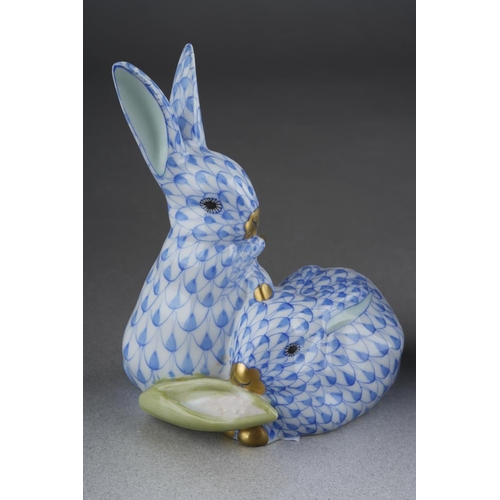 290 - Two Herend blue fish scale rabbit figures, comprising a seated rabbit, height 13cm approx and two ra... 