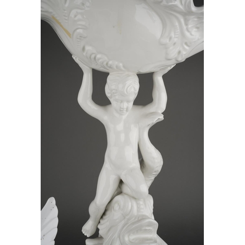 297 - A Capodimonte white glazed centrepiece, modelled as a scrolled foliate bowl supported atop a putti s... 