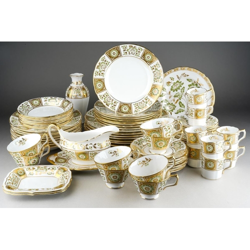 A Royal Crown Derby "Green Derby Panel" A1237 Eight Place Setting Dinner Service comprising dinner, lunch and side plates, soup bowls, dessert bowls, tea cups and saucers, coffee cans and saucers, an accent plate, gravy boat and stand, two small serving dishes and a vase [76 pieces]
