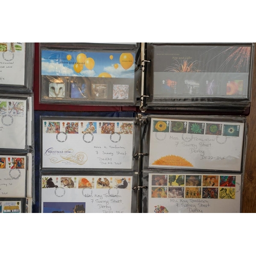 A collection of first day covers (three albums and a bag)
