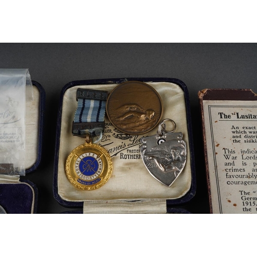 22 - Assorted early 20th Century / Wartime lot to include: boxed Lusitania (German) Medal; pin badges for... 