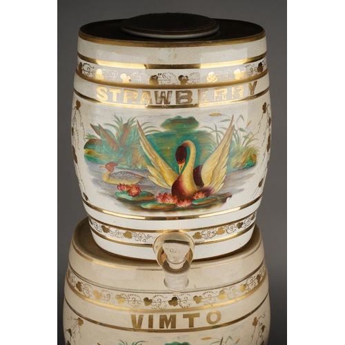 81 - Two Victorian stacking Hollinshead & Kirkham barrel shaped drink dispensers, both decorated with a S... 