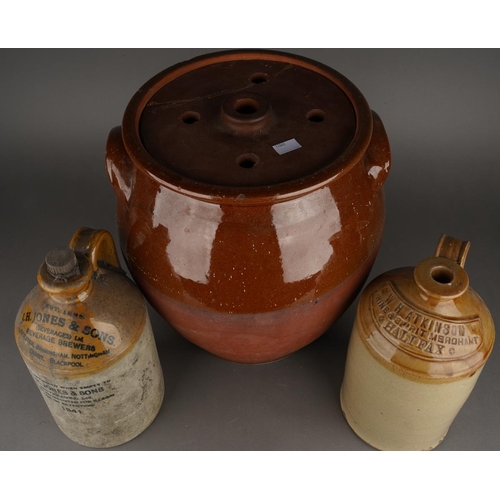 82 - An early 20th Century stoneware part glazed pippin / crock with terracotta pierced cover, approx 35c... 