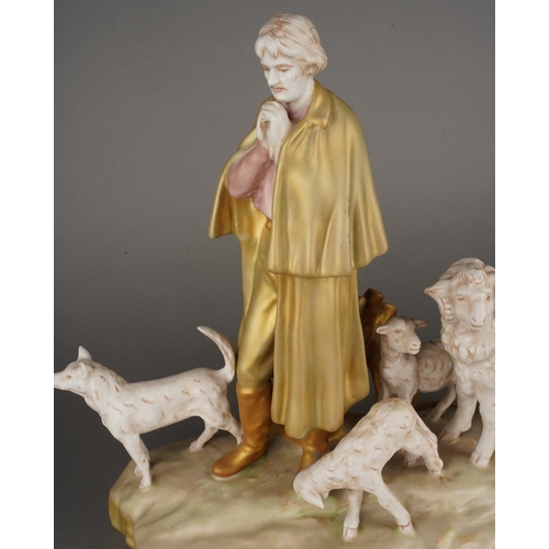 91 - A Royal Dux figural group of a praying Shepherd, Sheep and Sheep Dog, all standing on naturalistic b... 