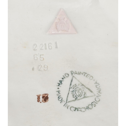 91 - A Royal Dux figural group of a praying Shepherd, Sheep and Sheep Dog, all standing on naturalistic b... 