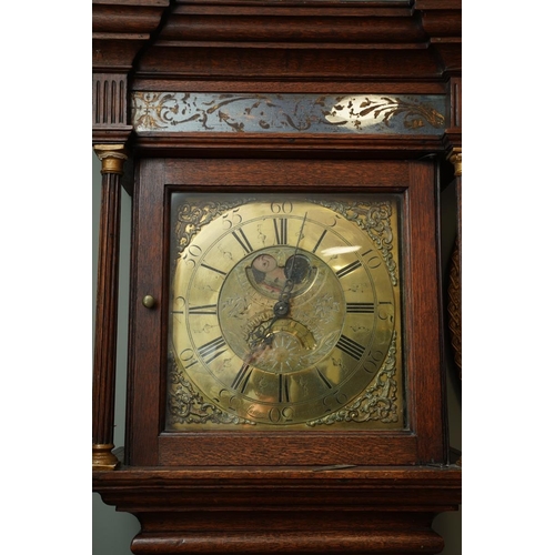 102 - A 19th Century oak cased long case clock, the hood surmounted by brass finial, the case with inlaid ... 