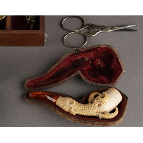 105 - Collector's lot including cased carved pipe with birds talon detail and amber spout together with ca... 